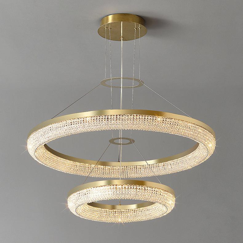 Cyrereon kroonluchter met ronde ringen van kristal in goudkleurige afwerking