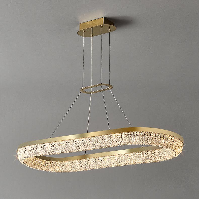 Cyrereon kroonluchter met ronde ringen van kristal in goudkleurige afwerking