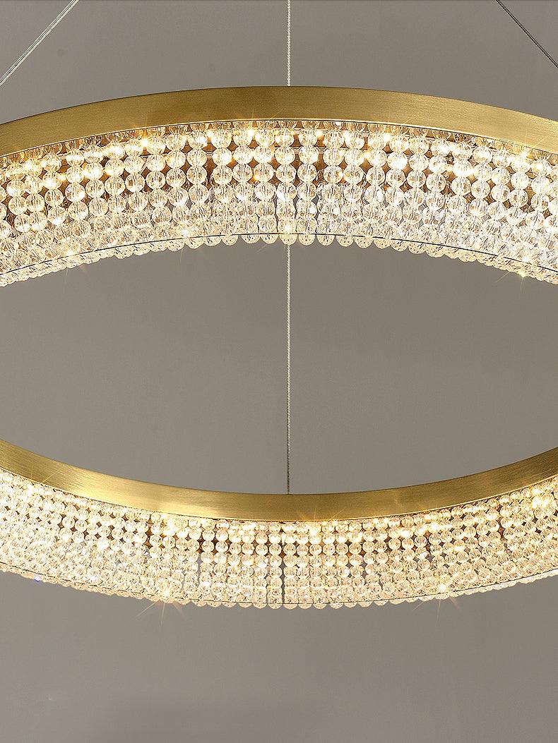 Cyrereon kroonluchter met ronde ringen van kristal in goudkleurige afwerking