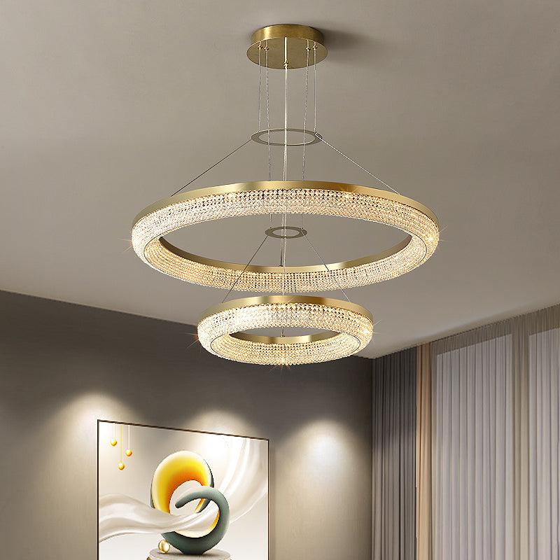 Cyrereon kroonluchter met ronde ringen van kristal in goudkleurige afwerking