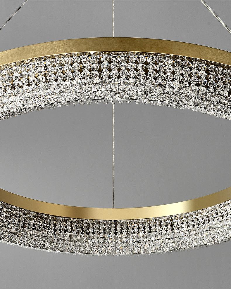 Cyrereon kroonluchter met ronde ringen van kristal in goudkleurige afwerking