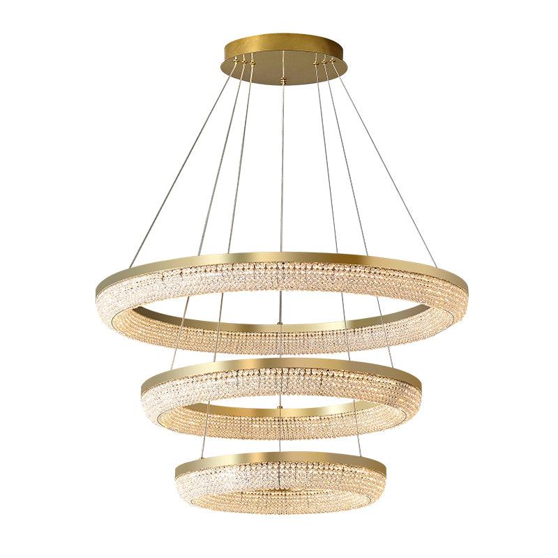 Cyrereon kroonluchter met ronde ringen van kristal in goudkleurige afwerking