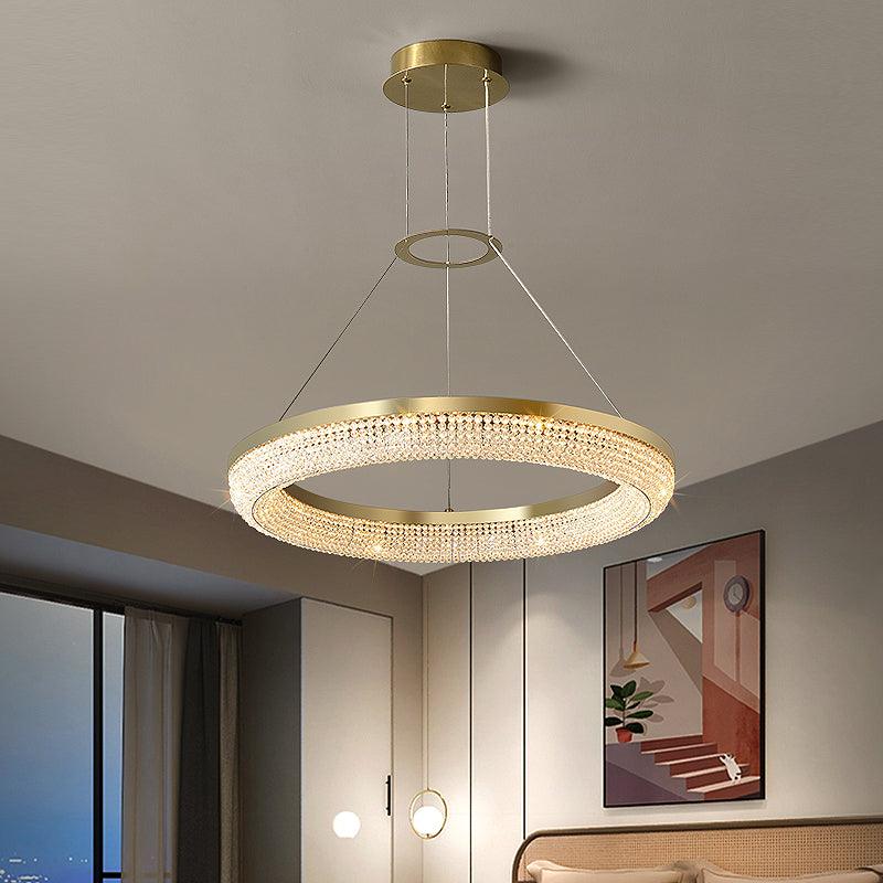 Cyrereon kroonluchter met ronde ringen van kristal in goudkleurige afwerking