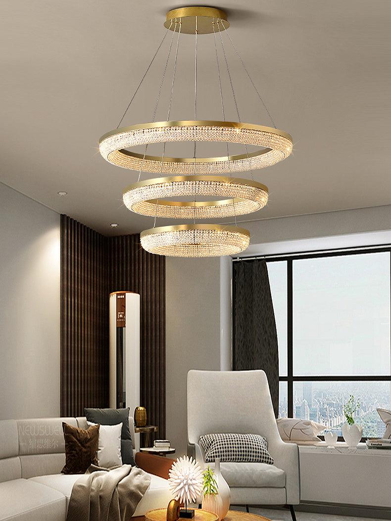 Cyrereon kroonluchter met ronde ringen van kristal in goudkleurige afwerking
