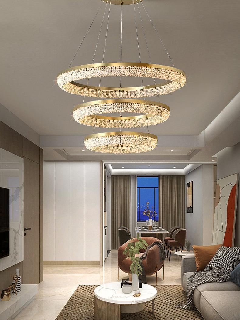 Cyrereon kroonluchter met ronde ringen van kristal in goudkleurige afwerking