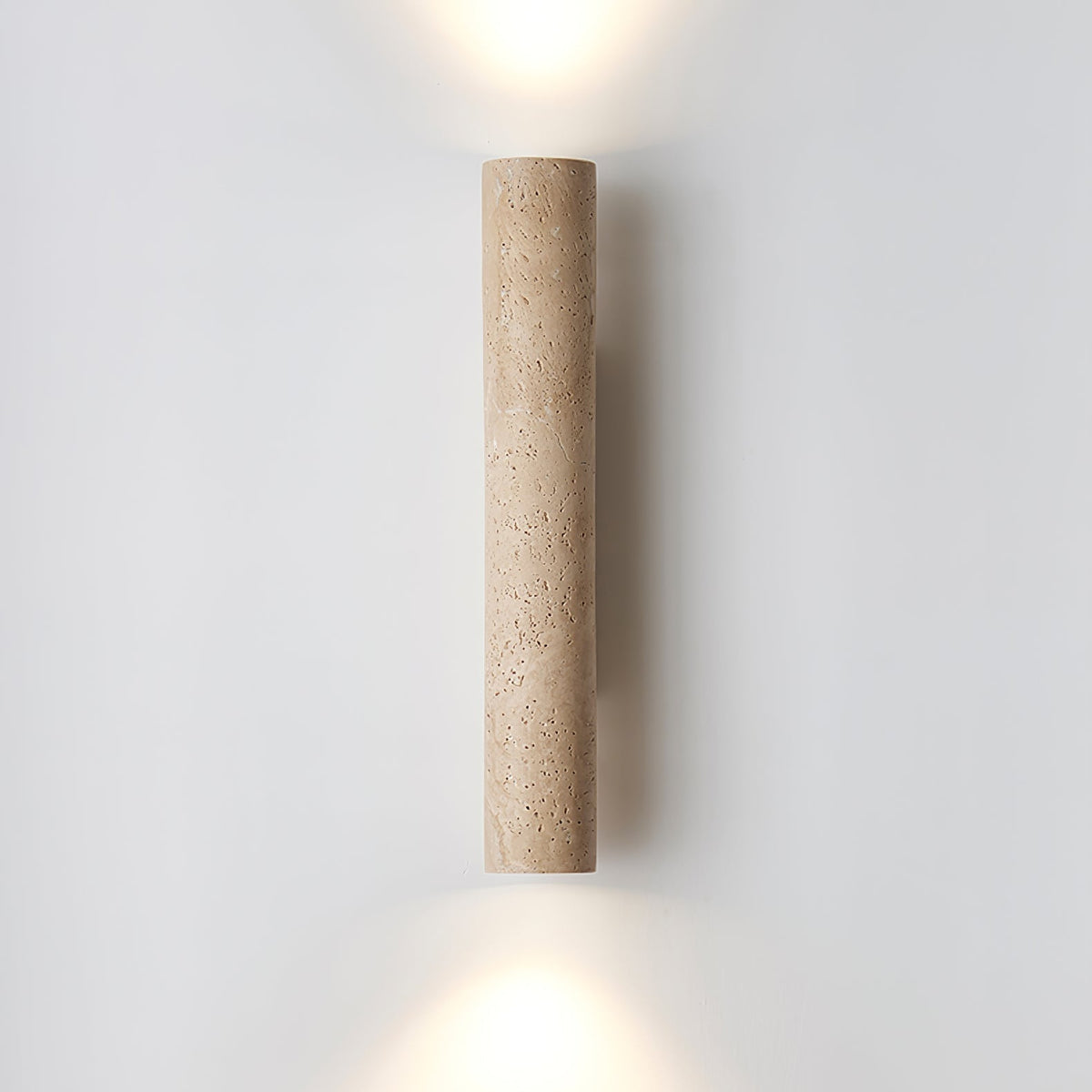 Seranise slanke cilindervormige wandlamp van geel travertin