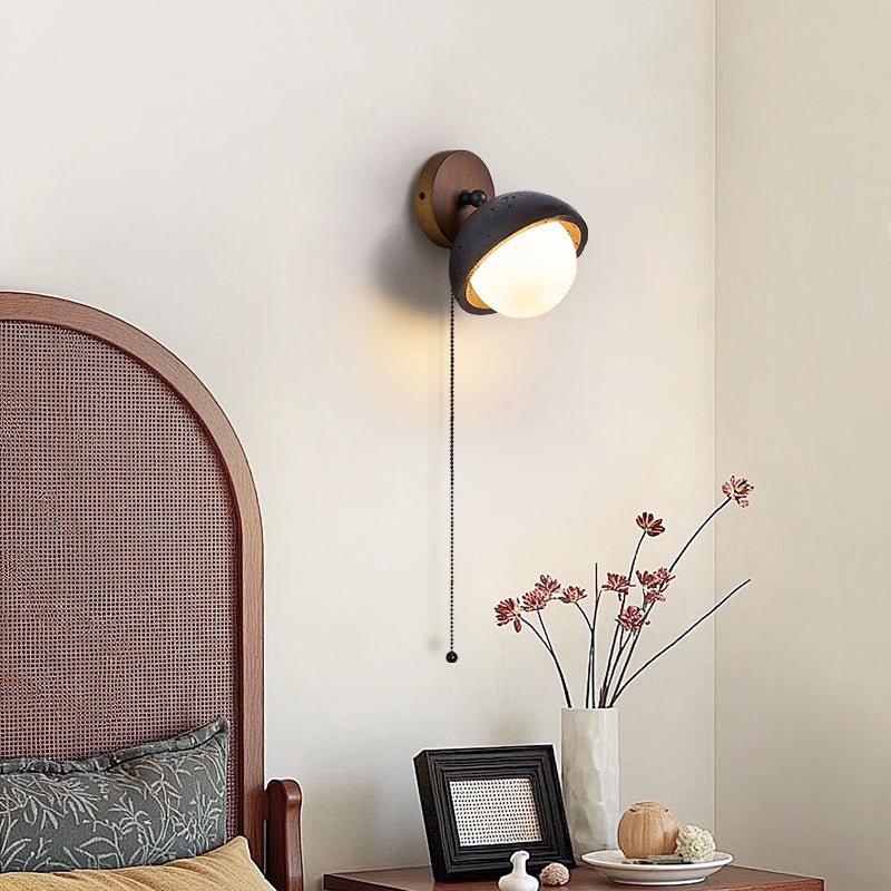 Serenaria bollen Zwart travertin Draaibaar wandlamp