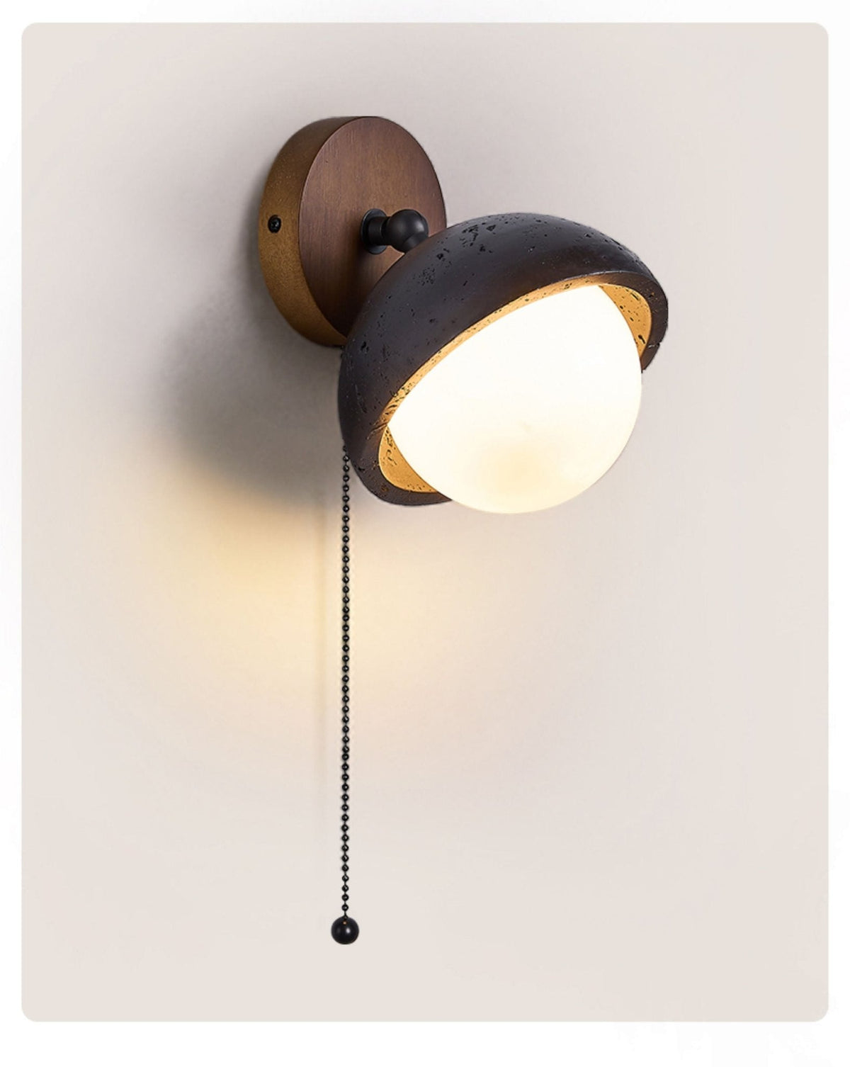 Serenaria bollen Zwart travertin Draaibaar wandlamp