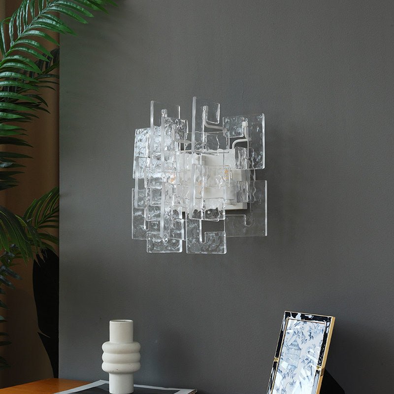 Stacked wandlamp met glazen kap