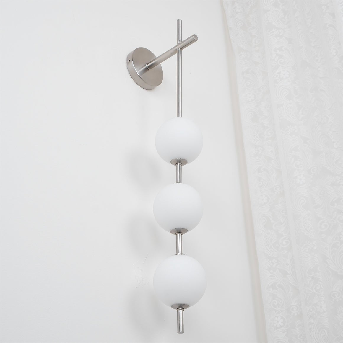 Ilraeia wandlamp met verticale bollen