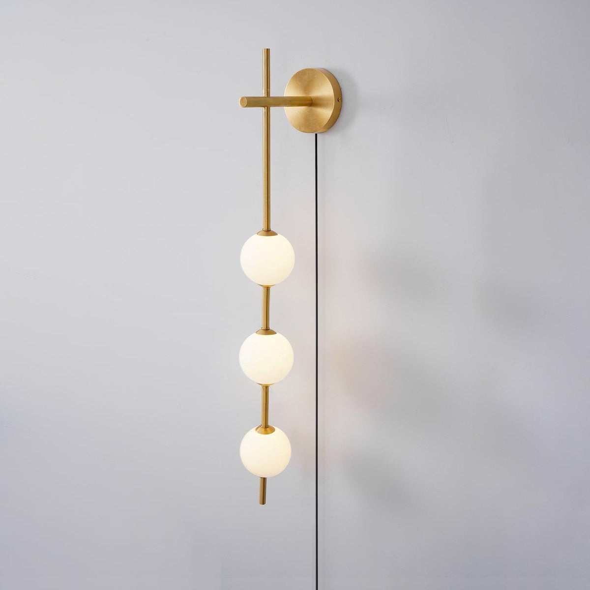 Ilraeia wandlamp met verticale bollen