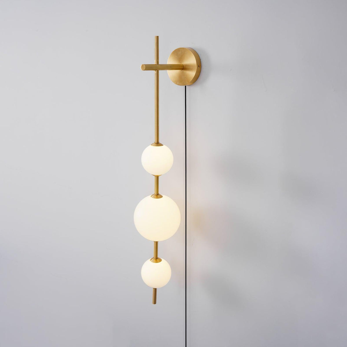 Ilraeia wandlamp met verticale bollen