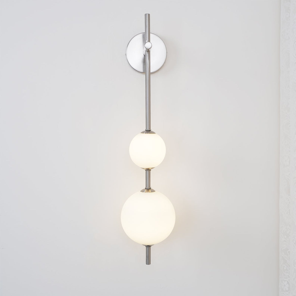 Ilraeia wandlamp met verticale bollen
