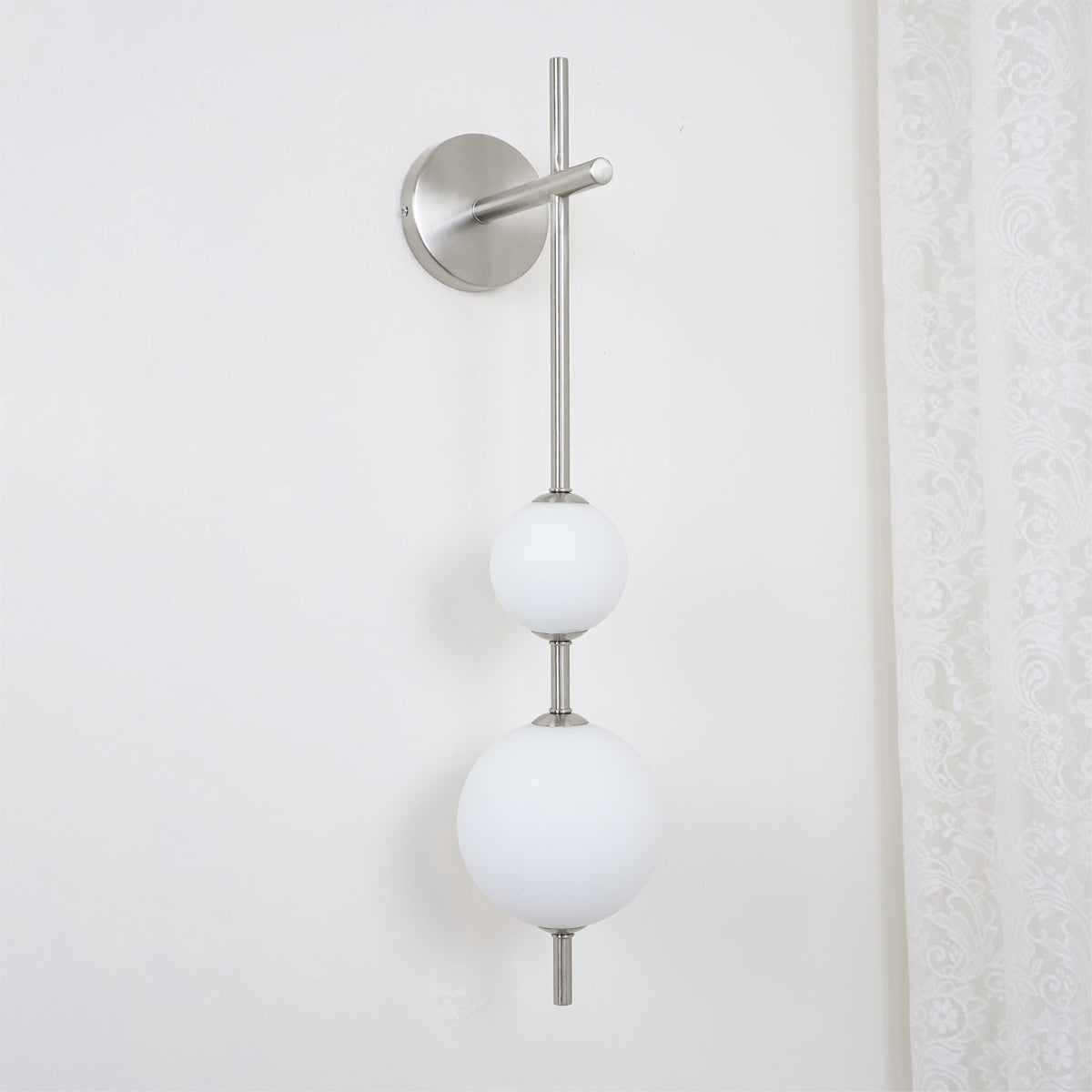 Ilraeia wandlamp met verticale bollen